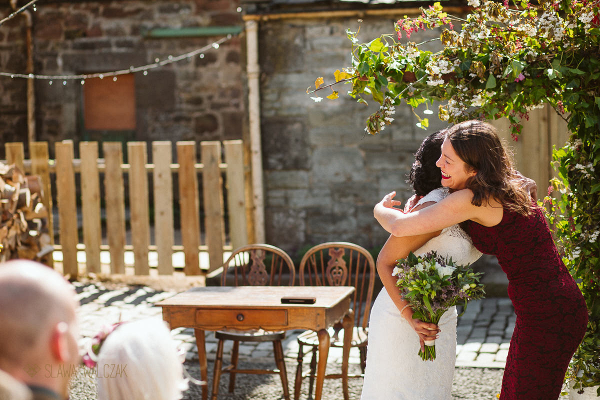 outdoor humanist ceremony during a farmhouse Wedding in Scotland