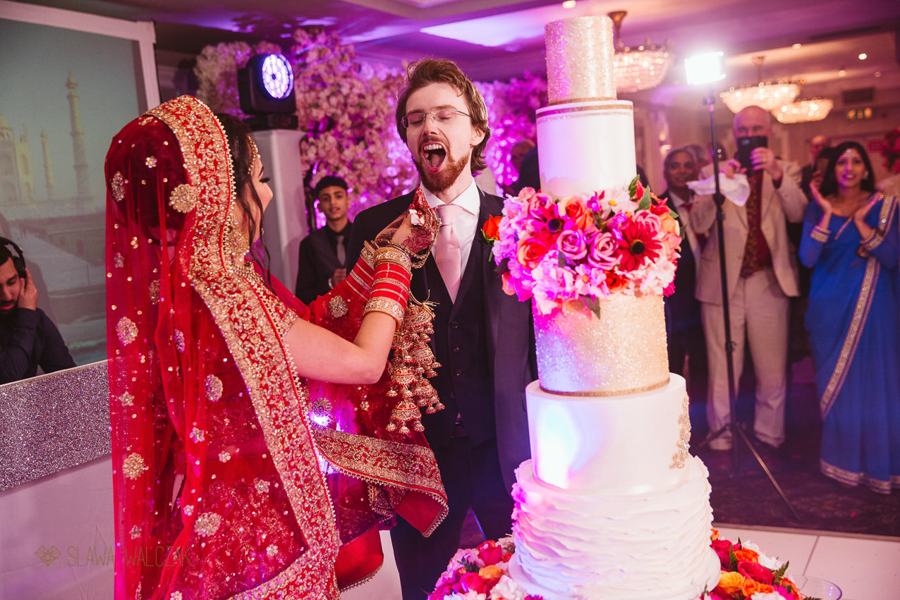 documentary photography from a cake cutting at an Indian wedding in London