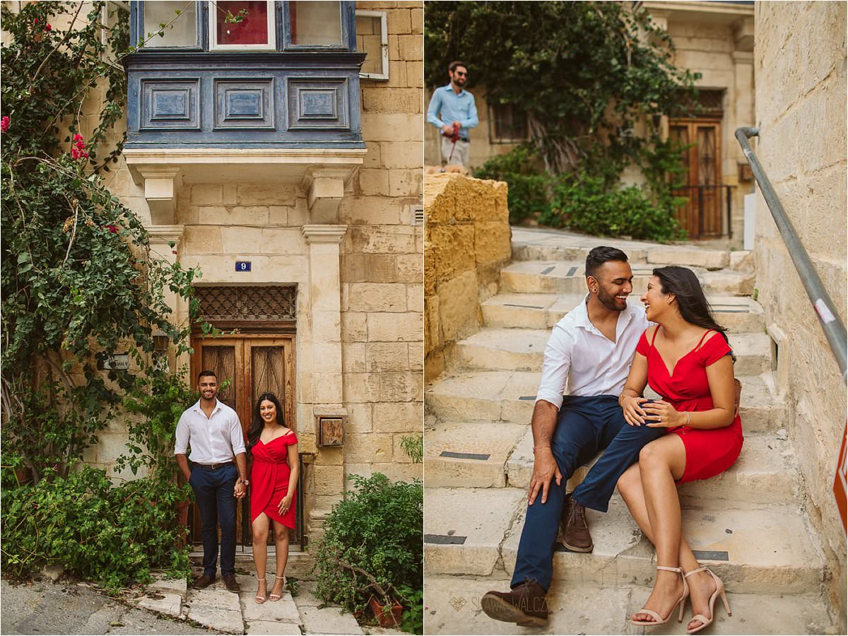 Couple posing for their engagement photos on the streets of Valletta in Malta