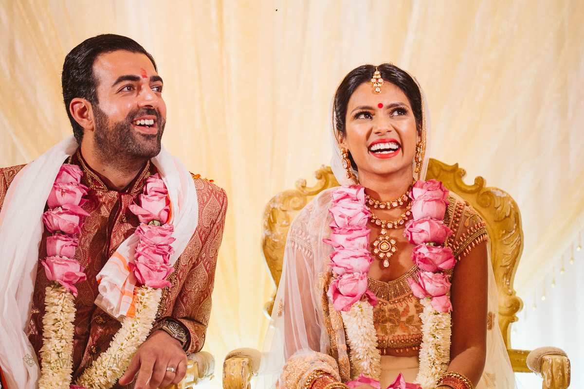 Indian bride and groom happy during ceremony