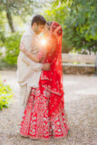 Indian bride and groom striking couple photoshoot
