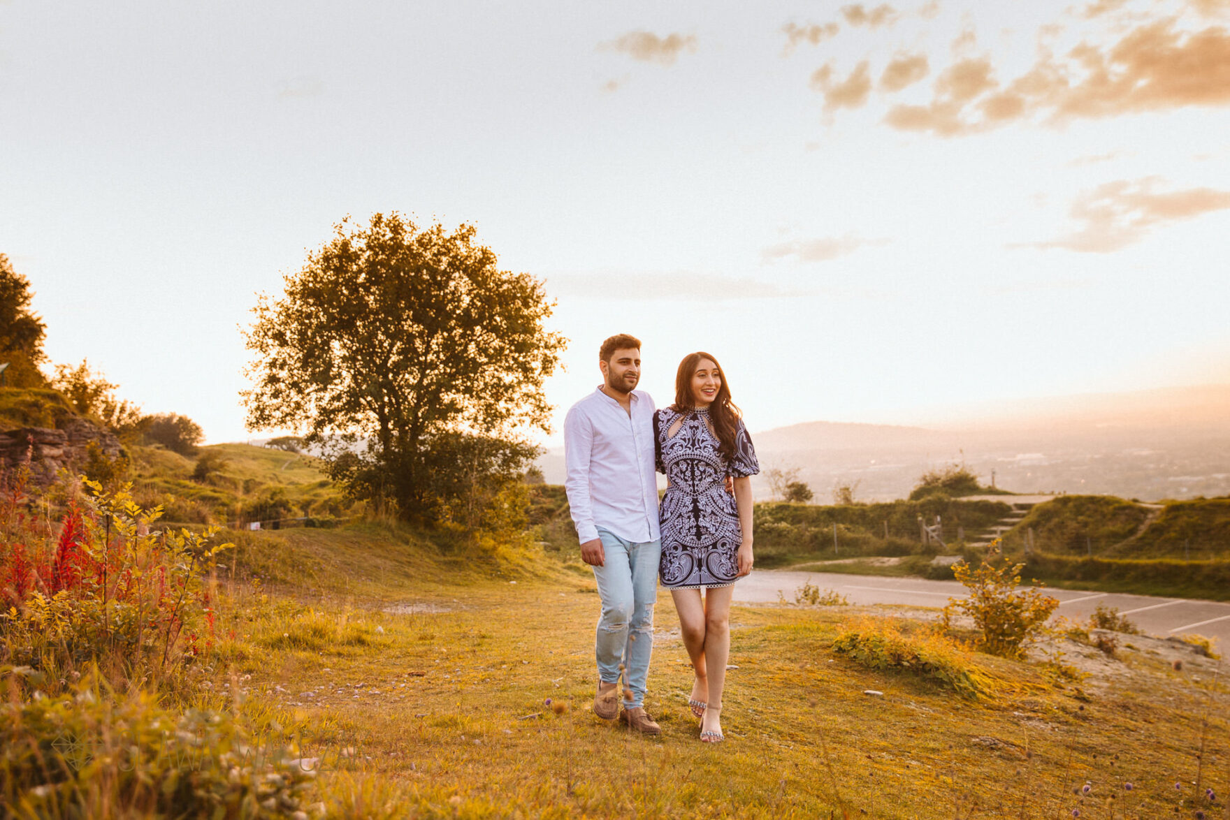 couple posing for their photos at one of Cheltenham hills