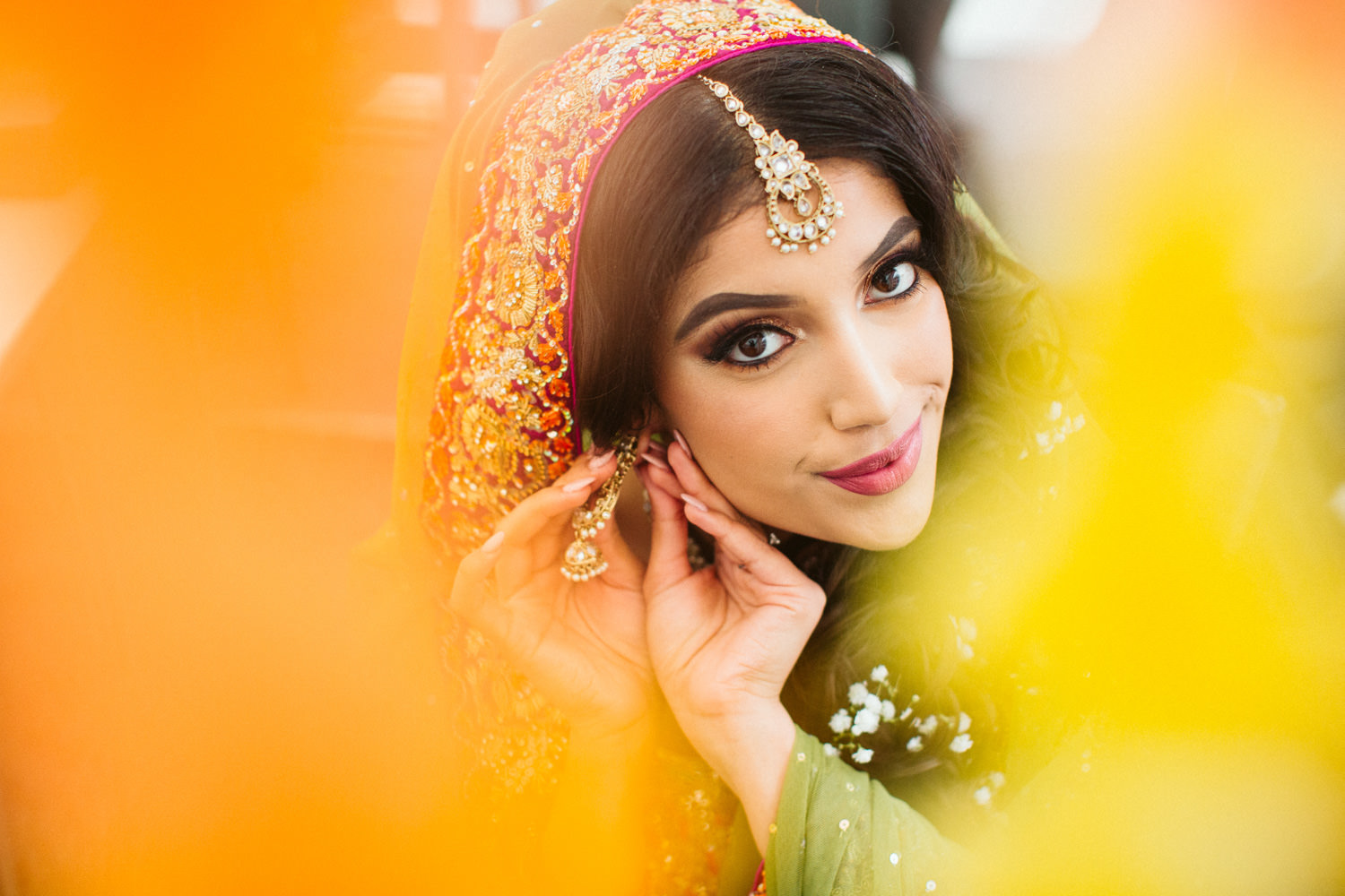 Elegant Asian Bride posing for her Mendhi Photos