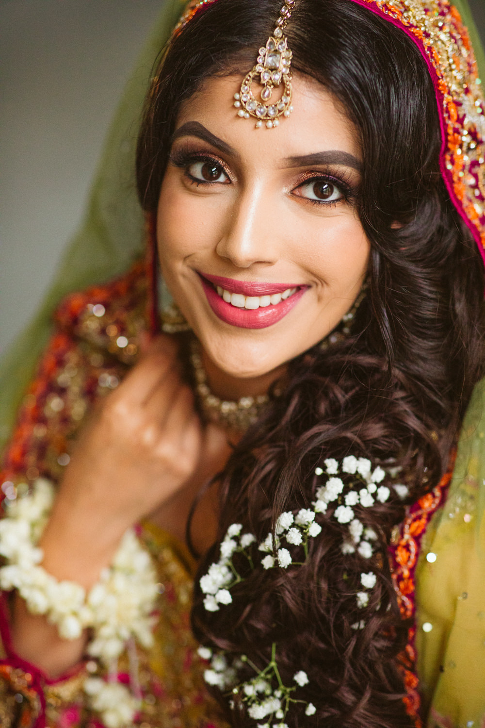 Gorgeous Asian Bride posing for bridal photos at her London Wedding