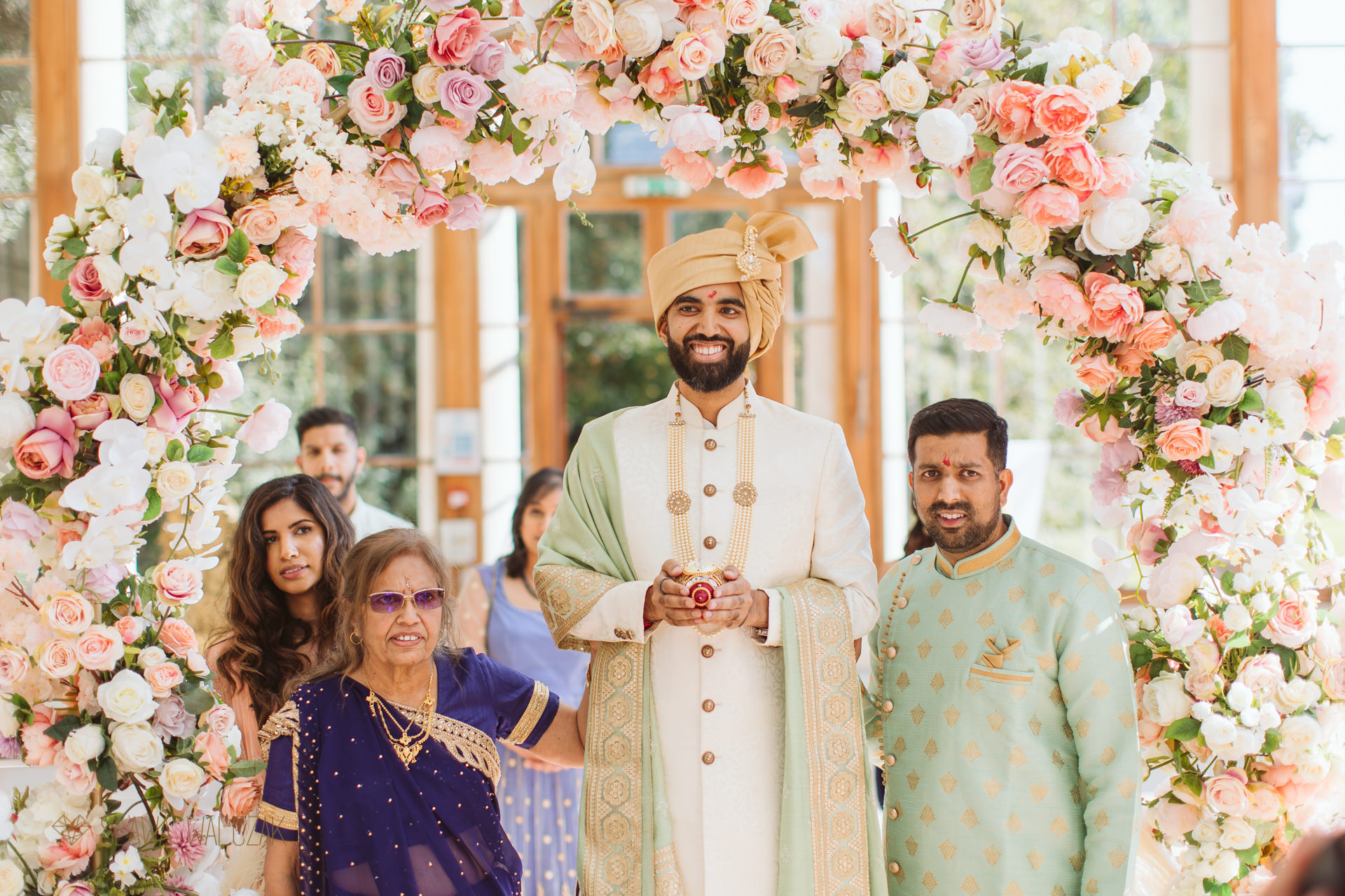 Indian groom entering Kew Gardens for his wedding