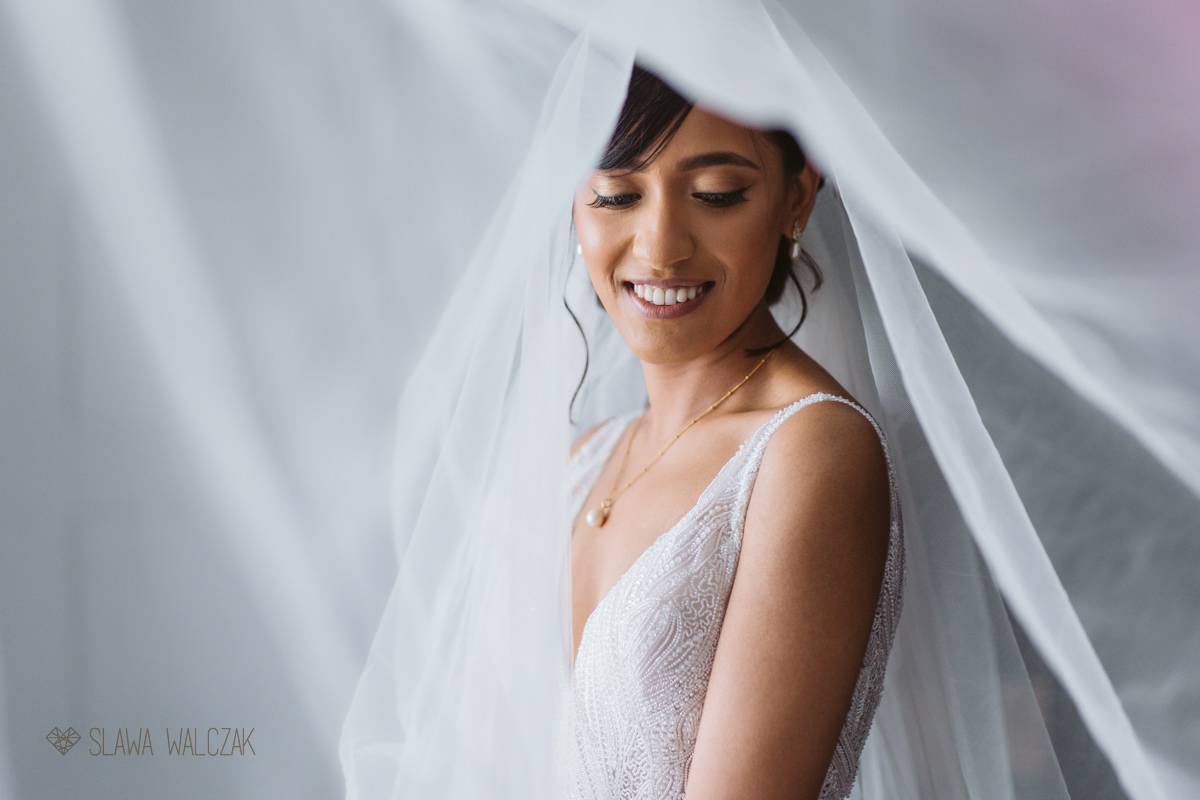 bridal veil photos from an Syon Park Indian Wedding