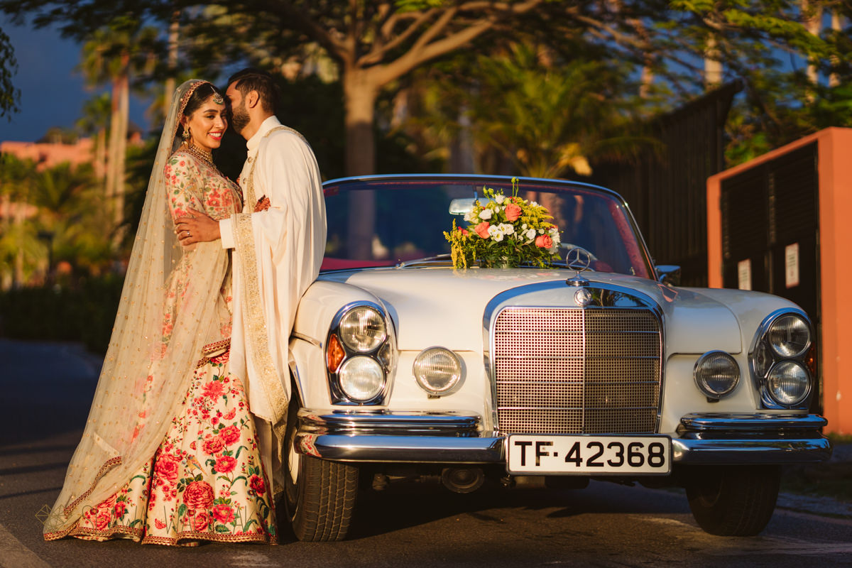 Indian couple posing for their sunset photos ar Ritz Carlton Abama